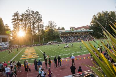football game at dusk in Redwood Bowl