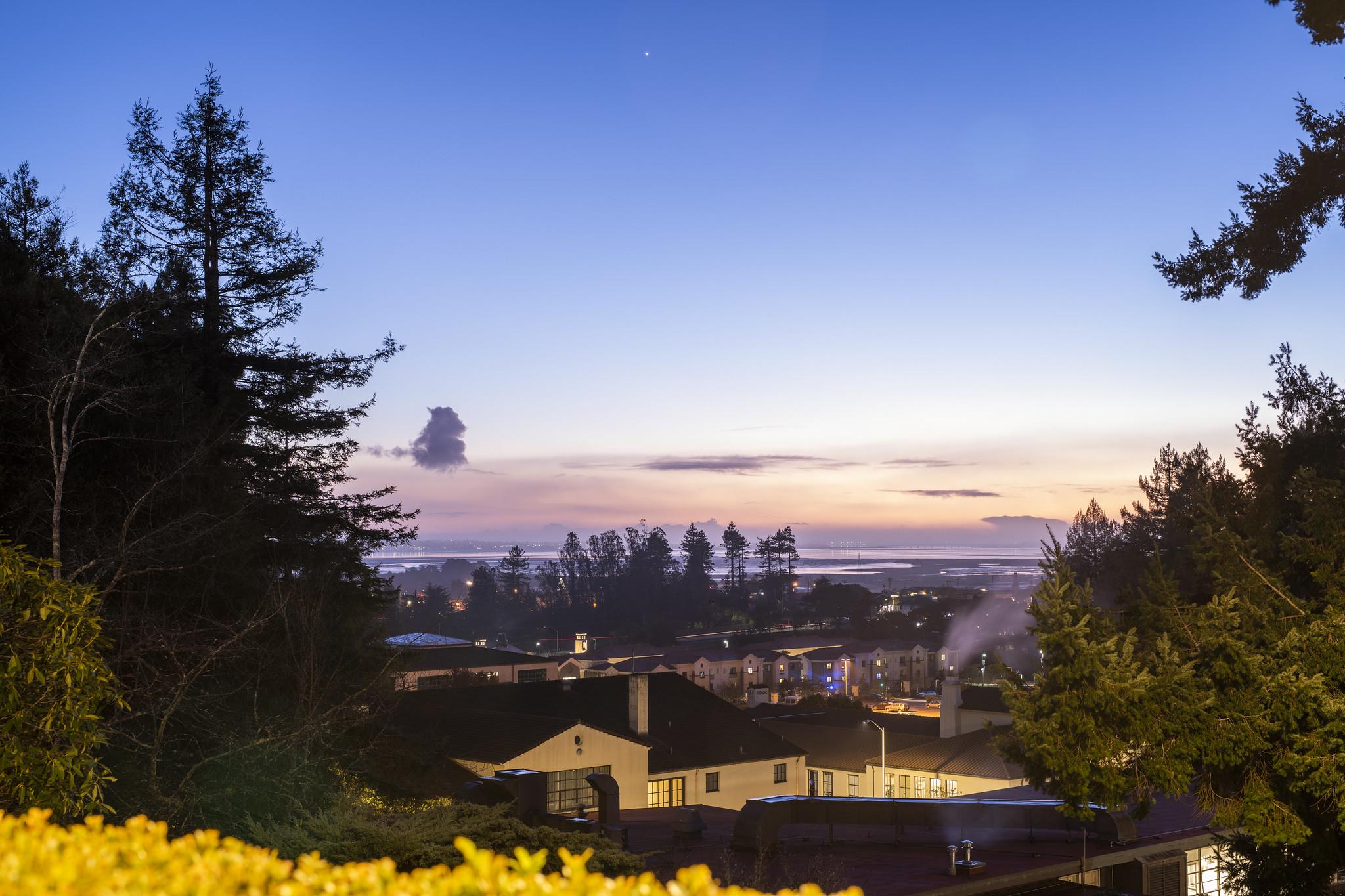 Photo shows an evening view of the Humboldt Bay, looking south-west from Founders Hall. 